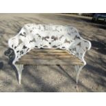 A cast aluminium garden bench in the Colebrookdale style depicting ferns and blackberries and with