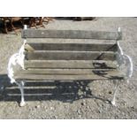 A Victorian style cast iron and teak garden bench with blackberry decoration 115 cm wide