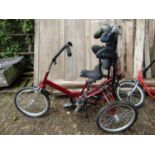 A collection of specialist cycle equipment by Tom Cat Trikes