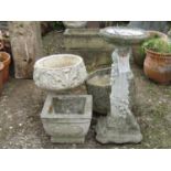 Three reclaimed pots of various shapes and sizes together with a bird bath with butterfly and ivy