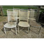 A set of six vintage stacking chairs on metal frames, seat and back panels