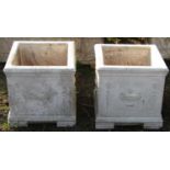 A pair of square cut garden planters with classical motif detail, 40 cm square