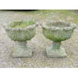 A pair of reclaimed fluted garden pots with acanthus detail on square cut bases, 45 cm in height