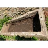 An ancient limestone trough, complete but restoration required, 245 cm x 100 cm x 43 cm (this lot