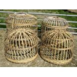 A set of three graduated bamboo cages of circular form, 90 cm diameter and smaller