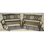 A pair of teak garden benches with slatted seats and decorated backs, 120 cm wide