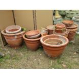 A quantity of reclaimed terracotta flower pots and planters, various sizes