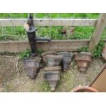 A cast iron garden water pump and nine cast iron guttering hoppers (10)