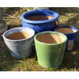 Four various glazed garden planters, 48 cm diameter and smaller