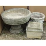 Four reclaimed garden pots, one of open shallow form raised on a fluted column 60 cm diameter and