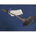 Possible William III silver spoon, with religious figural knop, wavy handle and broad bowl,