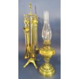 A mixed brass lot to include a hanging companion set, 64cm high, with further brass toasting fork