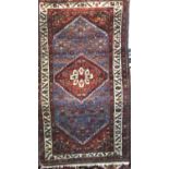 Good quality file pile Hammadam rug with central floral medallion with blue and dark grounds, 180