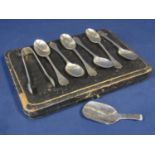 Cased suite of dog rose silver teaspoons together with a pair of sugar nips; together with a further