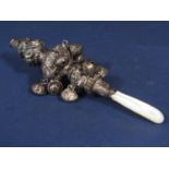 Victorian silver and mother-of-pearl baby's rattle and whistle, 16 cm long