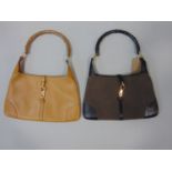 2 Gucci hand bags, both in same style with single handle, zipped inner pocket, with minimal signs of
