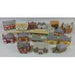 Large collection of assembled model buildings in card and plastic plus fences, bridges, signals etc
