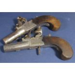 Pair of Canon barrel flintlock pistols of small proportions inscribed Horsham Oakes, 15.5 cm long (