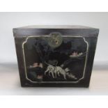 Japanese lacquered box, the top and sides decorated with dogs and floral still lifes, hinged lid and