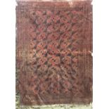 Unusual Bokhara type rug with geometric decoration upon a brick red ground, 175 x 130 cm
