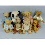 Collection of small teddy bears, some pre war with humped backs and boot button eyes, together