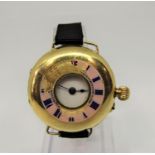 18ct half hunter lugg watch by Stewart Dawson & Co Ltd, the front with enamelled Roman numerals (