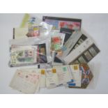 A bag of stamps from Hong Kong including presentation packs, Smiler sheet, FDC's, yearbooks, etc