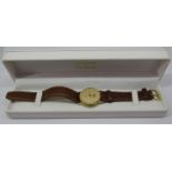 Gents 9ct Ingersoll quartz dress watch, champagne dial with baton markers, 31 mm case, currently