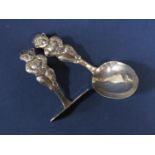 1920's novelty silver baby spoon and feeder, each shank with teddy bear decoration, maker