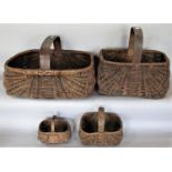 A collection of four antique wicker baskets