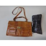A vintage snakeskin handbag with a faux snakeskin clutchbag