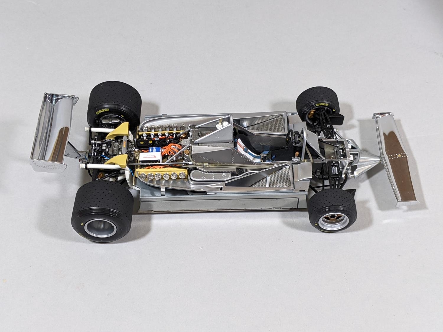 1:18 scale Ferrari 312 T4 Formula 1 racing car in polished aluminium chrome, no 97079 by Exoto - Image 4 of 6