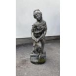 A reclaimed garden water feature in the form of a maiden pouring a lipped bowl 74 cm high