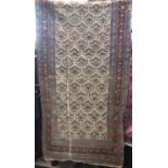 Eastern runner with geometric floral decoration upon a cream ground, 240 x 170 cm `