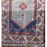 Persian full pile Lori type rug with large central pale medallion with geometric blue dot interior