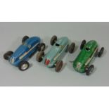 3 unboxed 1940's/50's toy cars 'The Mighty Midget Electric Racer' (AF), together with a small bag of