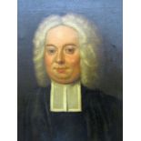 18th century school half length portrait of a clerical style gentleman holding a prayer book, in
