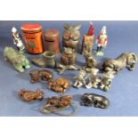 A box of interesting cabinet items comprising a collection of various netsukes, cast metal animals