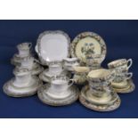 A collection of Aynsley teawares with floral border detail comprising pair of cake plates, milk jug,