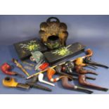 A collection of antique Meerschaum and other type pipes, together with a collection of lacquer