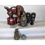 Mixed tribal and eastern wares to include two carved Indonesian bust figures, a cast metal figure of