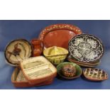 A collection of pottery wares with slip decoration comprising two oval dishes, a pair of rectangular