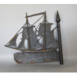 An ebonised or Japanned sheet metal weather vane or finial in the form of a two mast galleon, 50cm