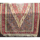 Unusual Sumac carpet with red, blue floral and running decoration, 230 x 140 cm