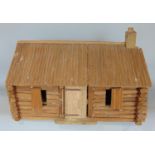 A rustic built timber cabin, probably Scandinavian, together with a quantity of internal fittings,