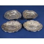 Pair of Victorian silver heart shaped bonbon dishes with raised pierced rims, makers marks worn,