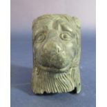 Patenated cast bronze staff mount in the form of a lion bust, 9 cm high