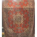 Unusual thin Kashan carpet/runner with twin large floral medallion decoration upon a burnt orange