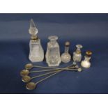 A mixed lot of silver comprising a collection of glass scent bottles, four with silver rims, one
