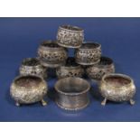 A collection of Eastern white metal (untested) napkin ring (4&2), together with a further pair of